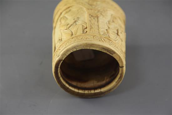 A carved ivory situla, late 19th century in Medieval style, height 6.5in.